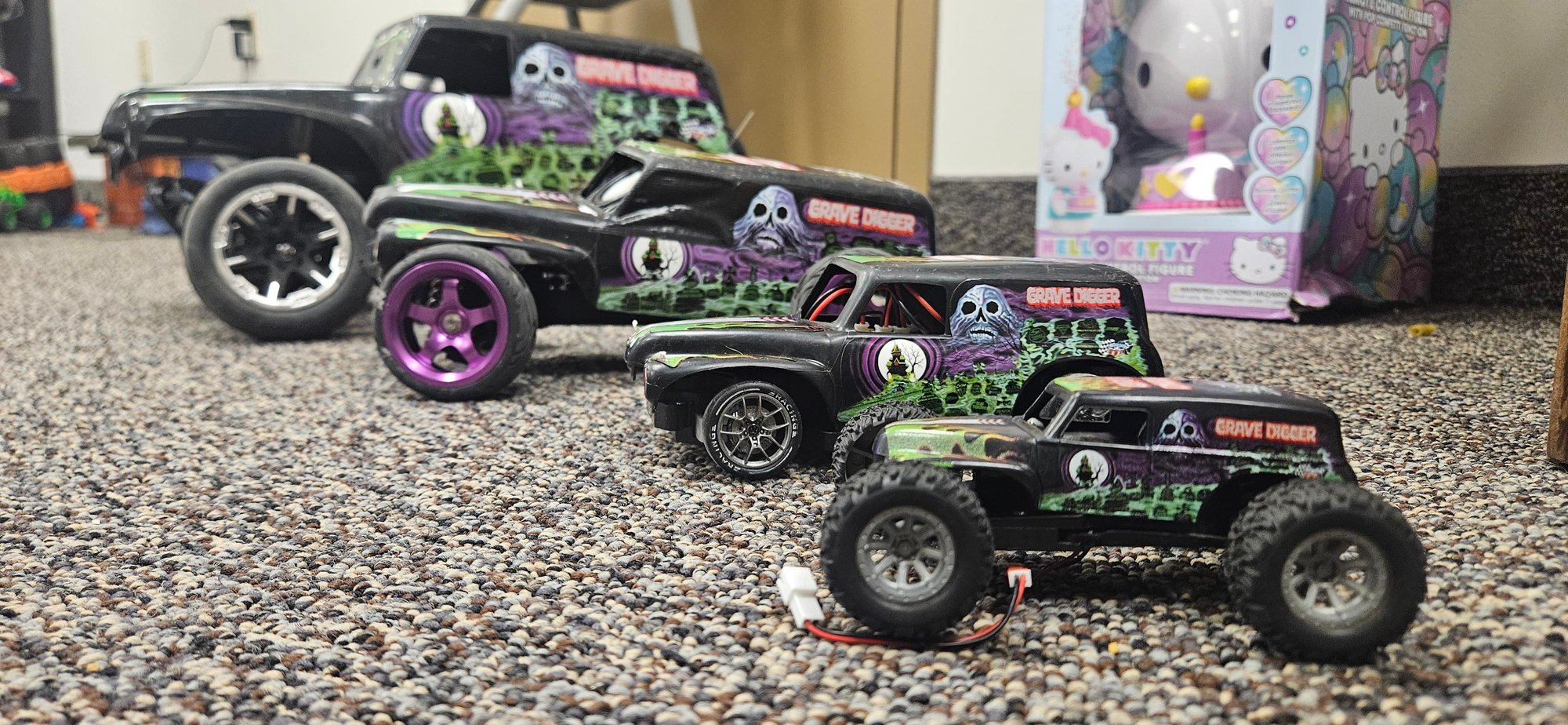 4 different modified grave digger monster trucks